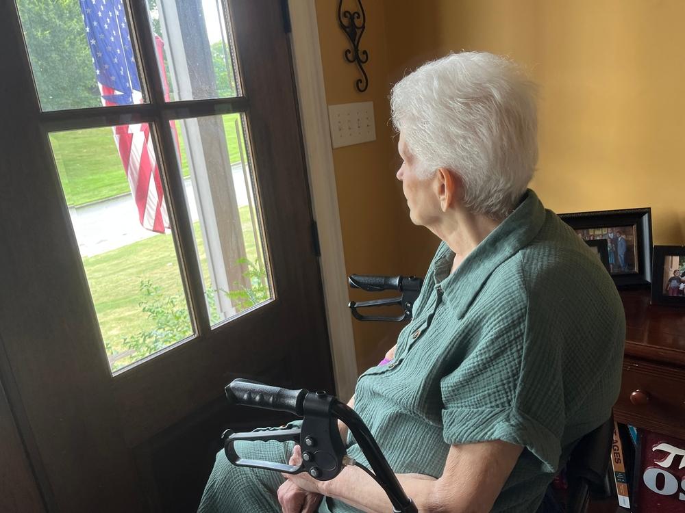 Veteran memory care resident in wheelchair at assisted living home in Detroit, MI