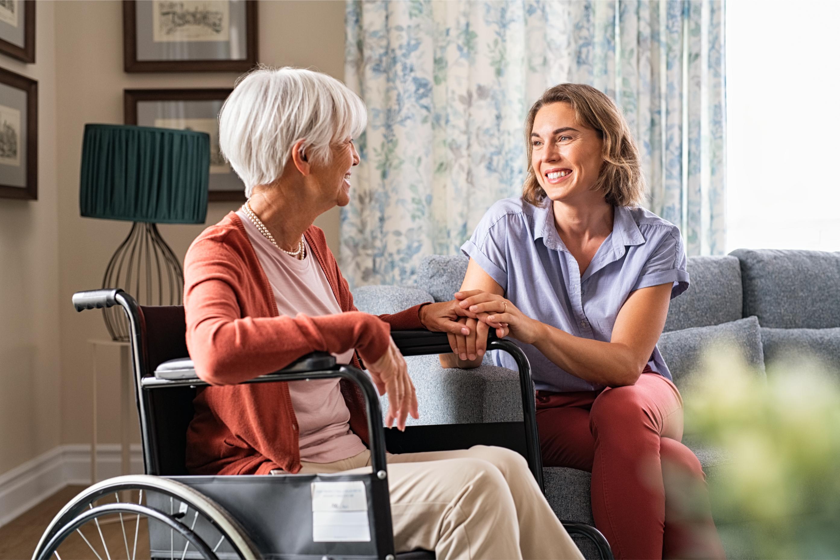 Caregiver providing long-term assisted living support to a senior resident in Detroit, MI